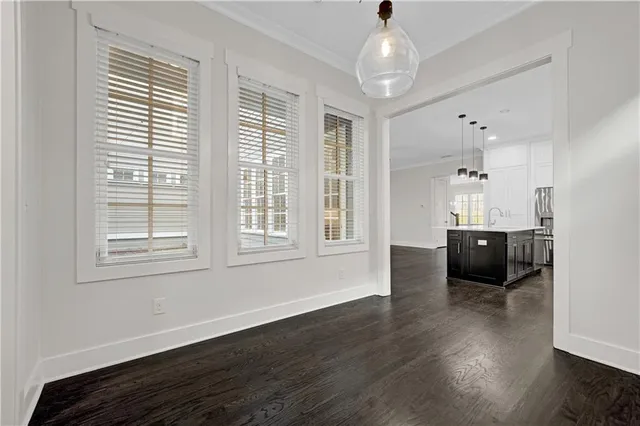 a bedroom with a balcony a bed and a couch