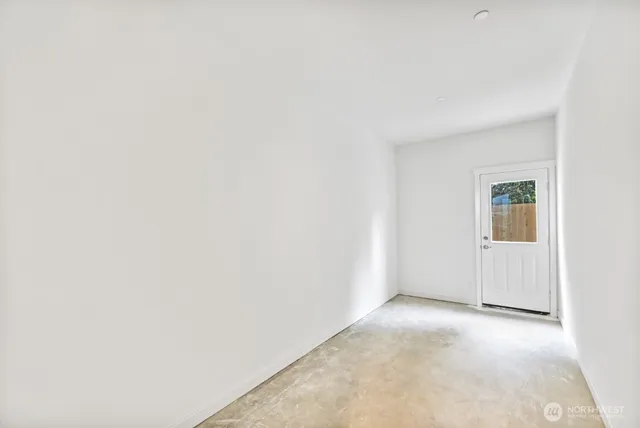 a view of a backyard with plants