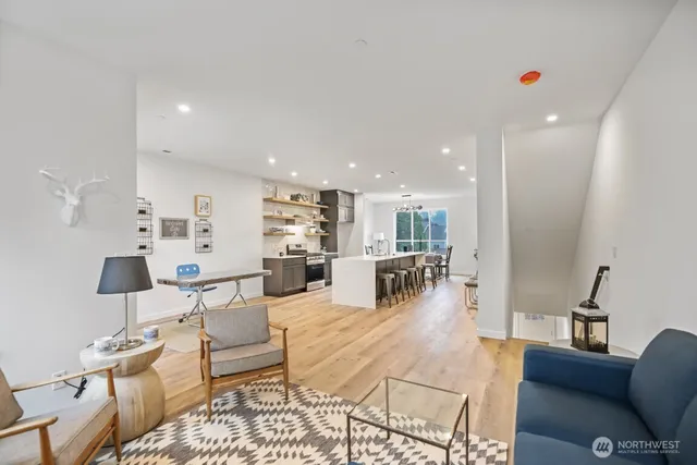 a living room with furniture and a table
