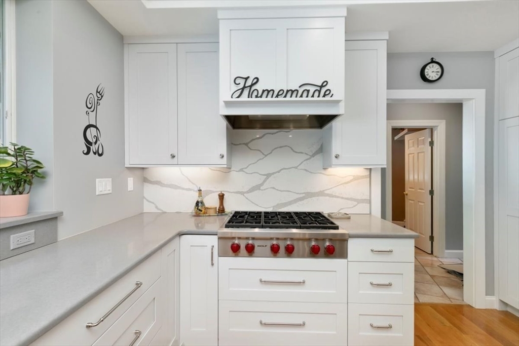 9 Perley Lane Boxford, MA 01921 - Photo 12 of 41 a kitchen with a stove and cabinets