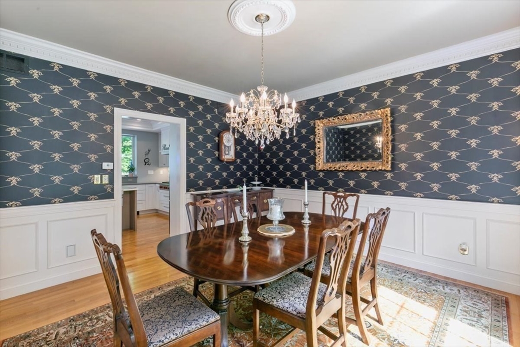 9 Perley Lane Boxford, MA 01921 - Photo 16 of 41 a view of a dining room with furniture and chandelier