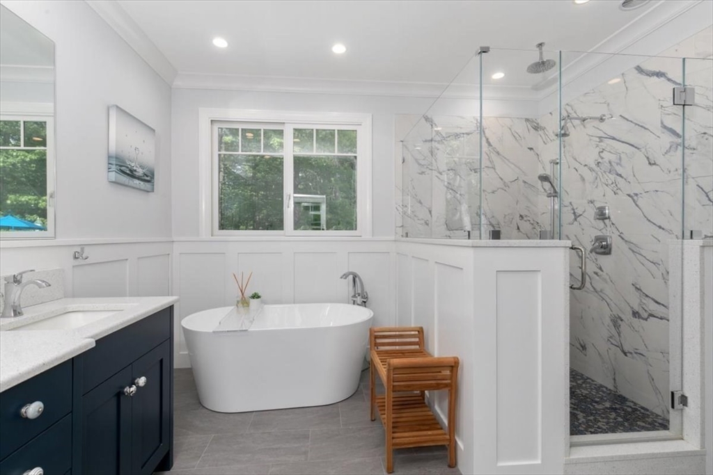 9 Perley Lane Boxford, MA 01921 - Photo 20 of 41 a bathroom with a bathtub and a sink