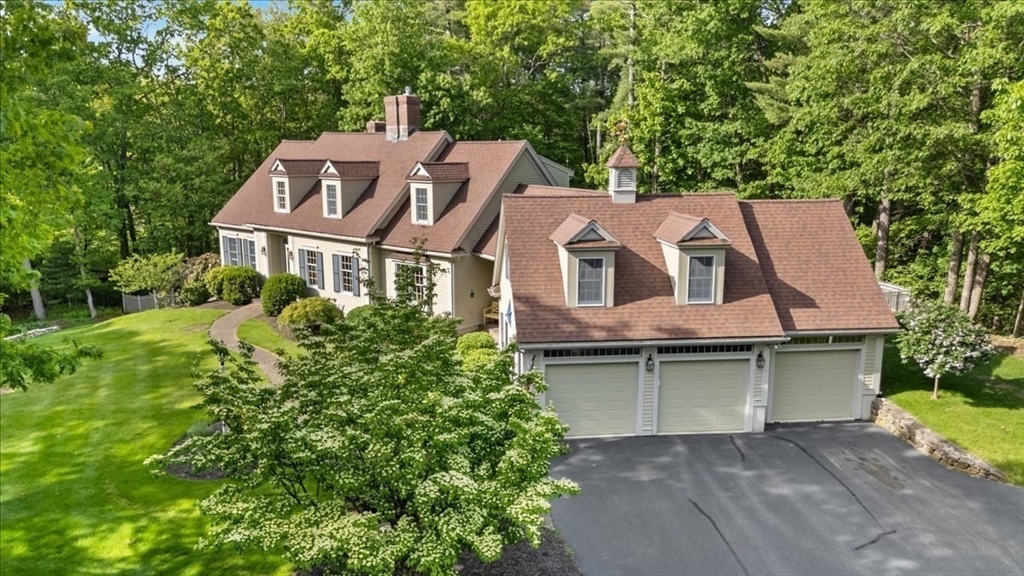 9 Perley Lane Boxford, MA 01921 - Photo 2 of 41 an aerial view of a house with a yard and balcony
