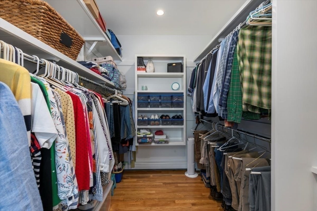 9 Perley Lane Boxford, MA 01921 - Photo 22 of 41 a view of walk in closet with clothes and shoes