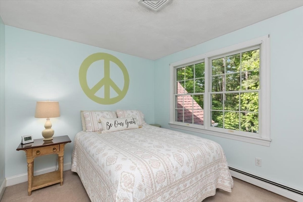 9 Perley Lane Boxford, MA 01921 - Photo 29 of 41 a bedroom with a bed and a window