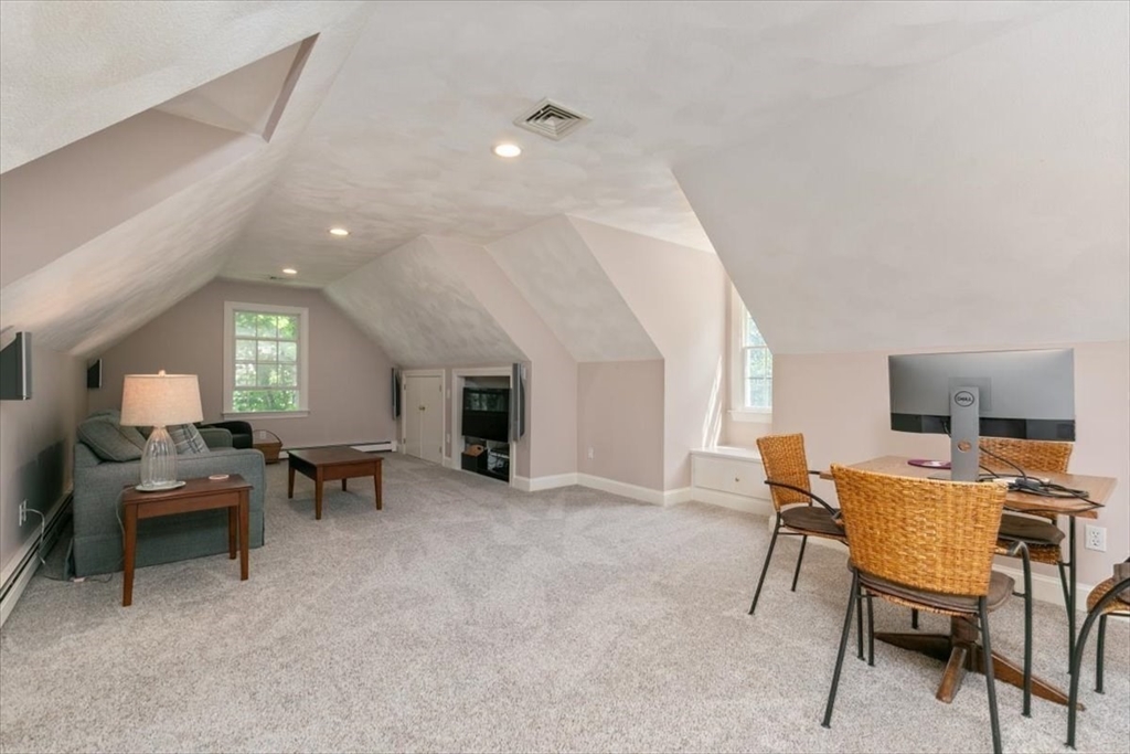 9 Perley Lane Boxford, MA 01921 - Photo 32 of 41 a view of a livingroom with furniture and a kitchen