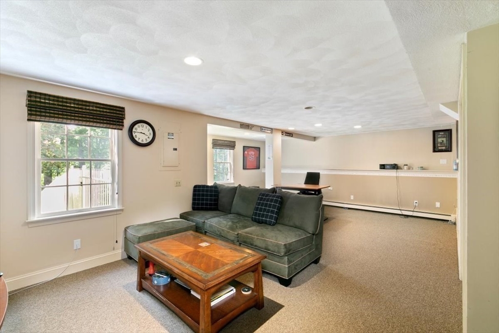 9 Perley Lane Boxford, MA 01921 - Photo 33 of 41 a living room with furniture and a window