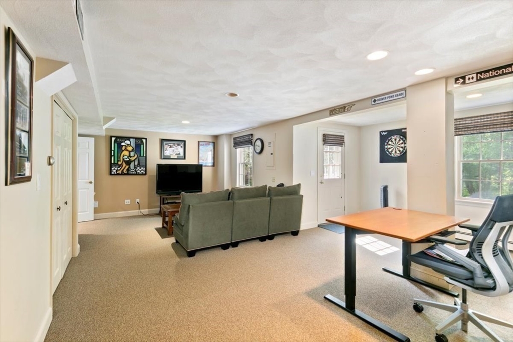 9 Perley Lane Boxford, MA 01921 - Photo 34 of 41 a living room with furniture and a flat screen tv