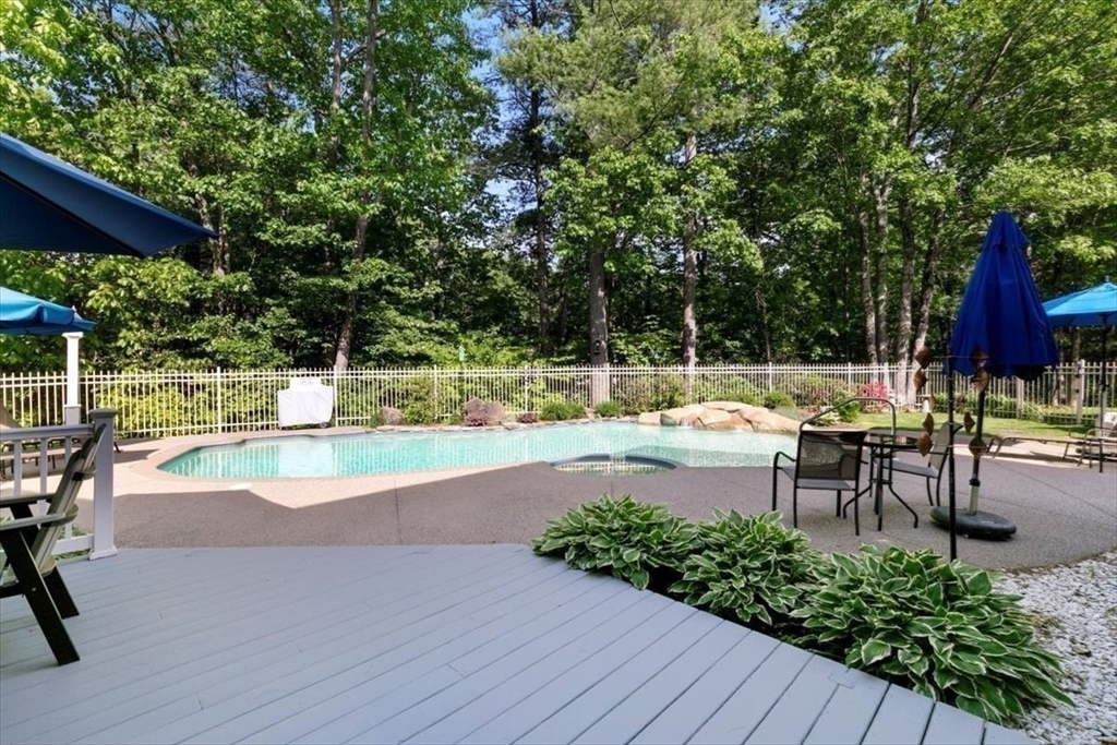 9 Perley Lane Boxford, MA 01921 - Photo 39 of 41 a view of a swimming pool with a patio