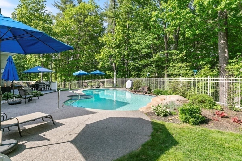 9 Perley Lane Boxford, MA 01921 - Photo 41 of 41 a view of a backyard with sitting area and garden