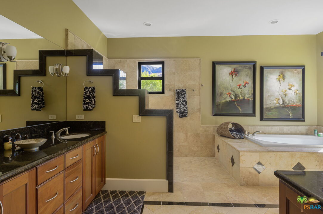 38851 Nielson Road Rancho Mirage, CA 92270 - Photo 12 of 50 a bathroom with a sink and a mirror