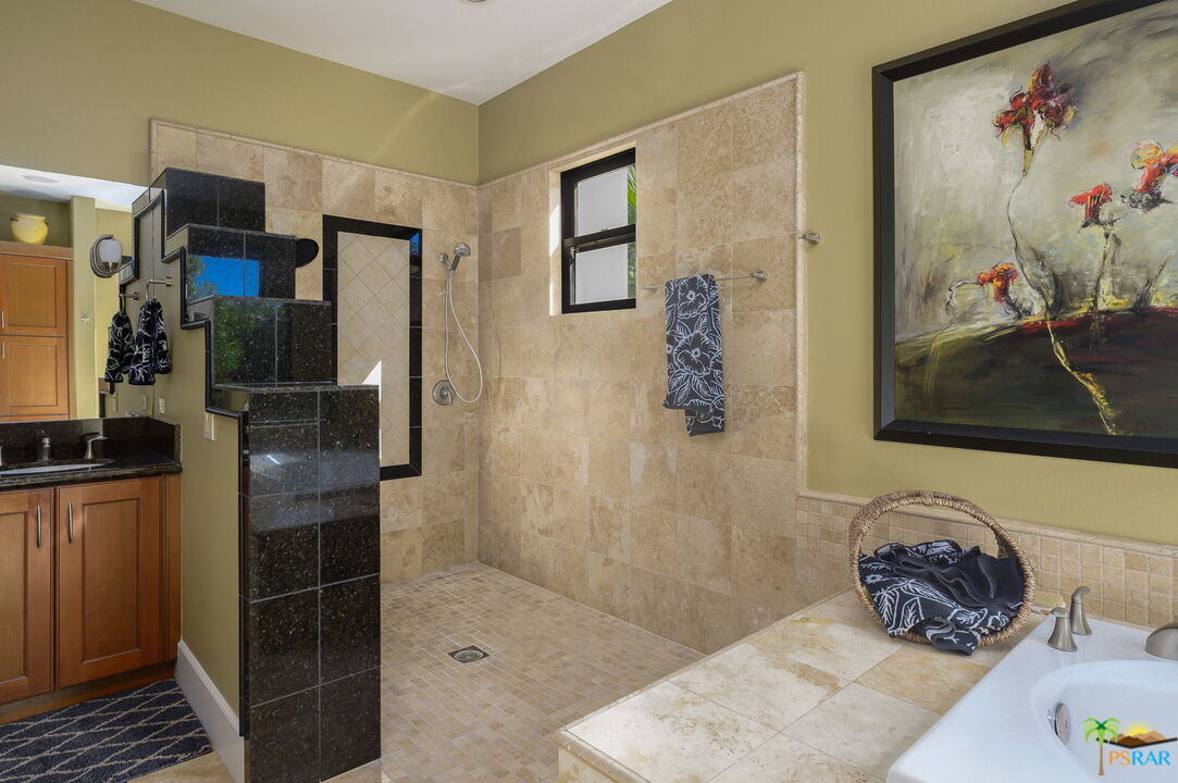 38851 Nielson Road Rancho Mirage, CA 92270 - Photo 14 of 50 a bathroom with a tub shower and sink