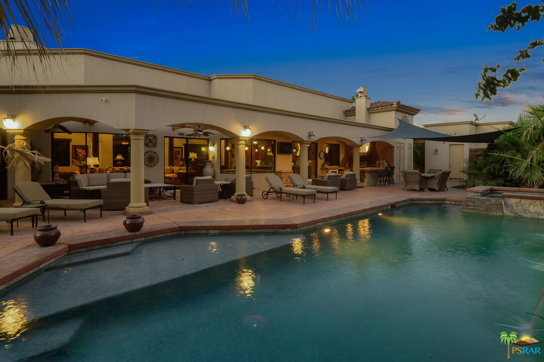 38851 Nielson Road Rancho Mirage, CA 92270 - Photo 2 of 50 a view of a house with pool and chairs