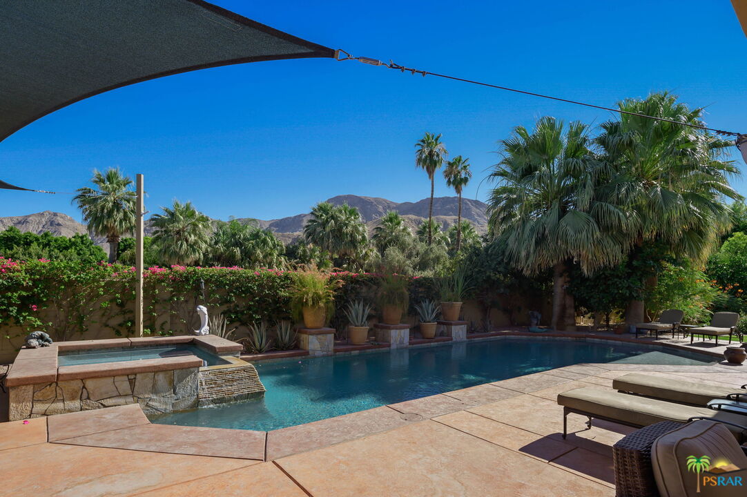 38851 Nielson Road Rancho Mirage, CA 92270 - Photo 21 of 50 a view of a swimming pool with a patio