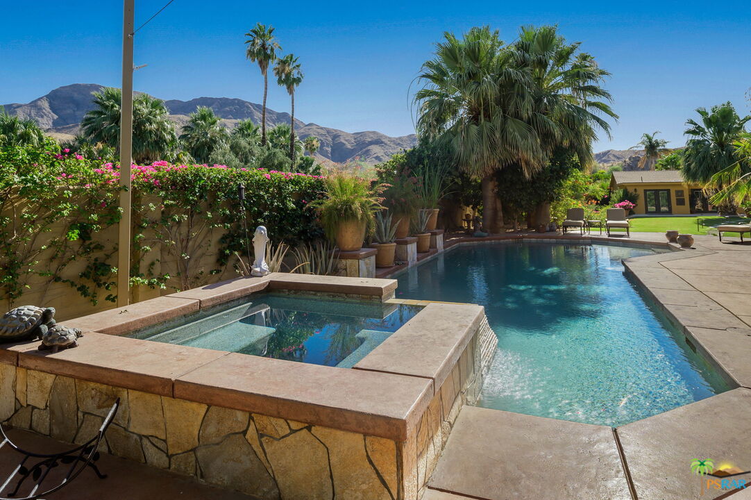 38851 Nielson Road Rancho Mirage, CA 92270 - Photo 23 of 50 a view of a swimming pool with a patio