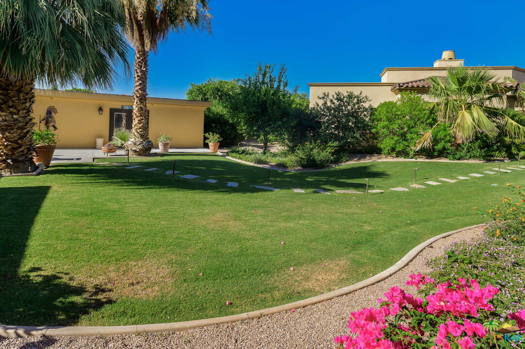 38851 Nielson Road Rancho Mirage, CA 92270 - Photo 28 of 50 a view of a yard with palm trees