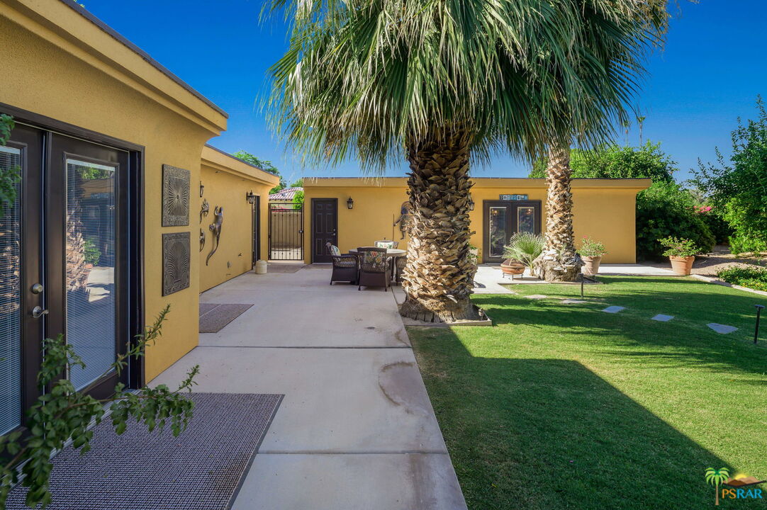 38851 Nielson Road Rancho Mirage, CA 92270 - Photo 30 of 50 a front view of house with yard and green space