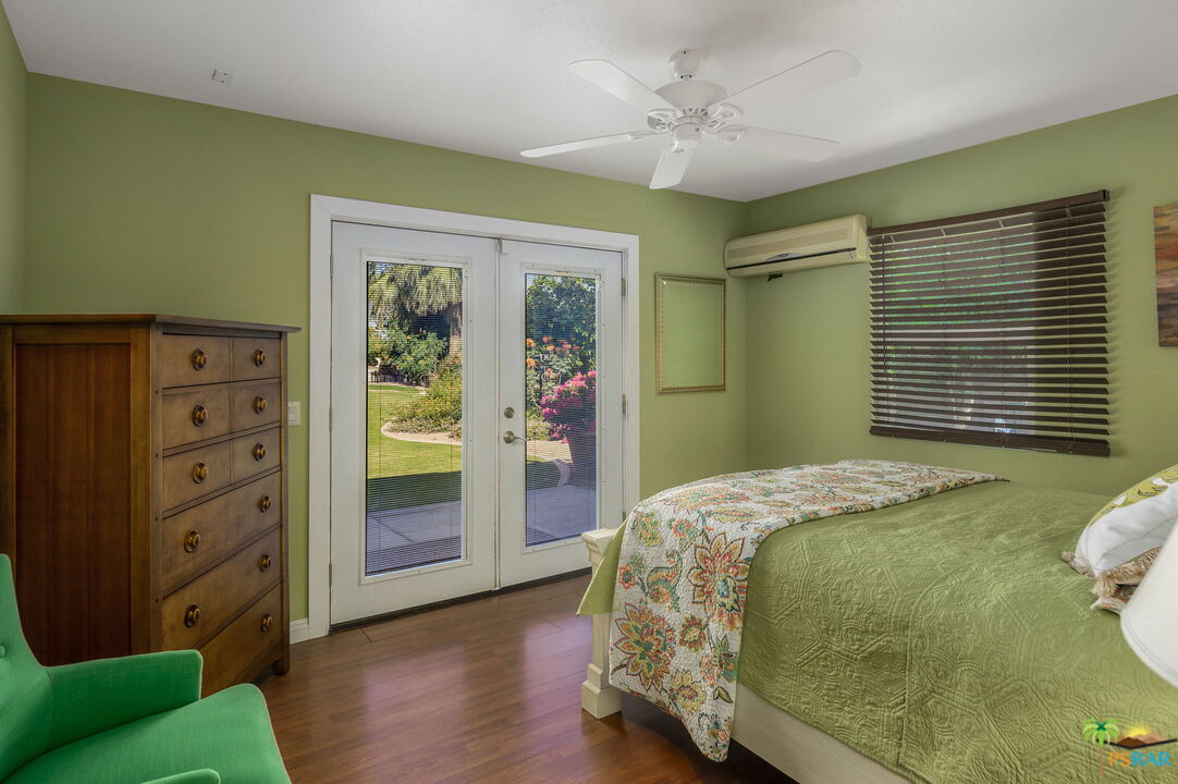 38851 Nielson Road Rancho Mirage, CA 92270 - Photo 37 of 50 a bedroom with a bed and a window