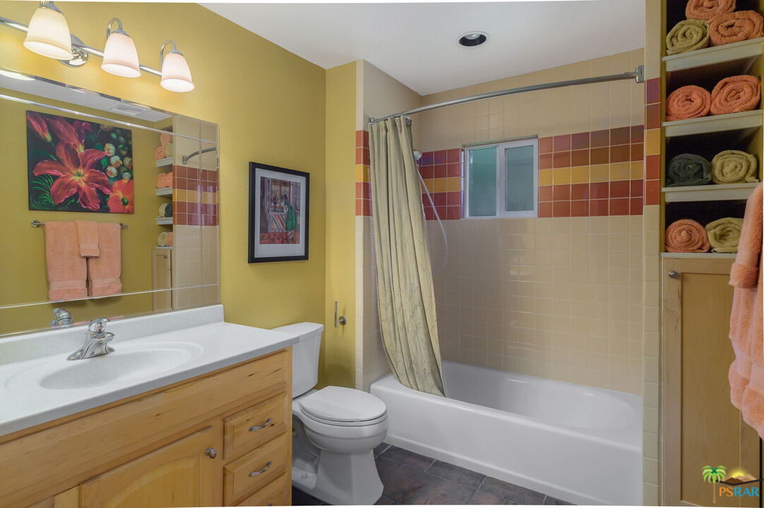 38851 Nielson Road Rancho Mirage, CA 92270 - Photo 38 of 50 a bathroom with a sink a toilet and shower