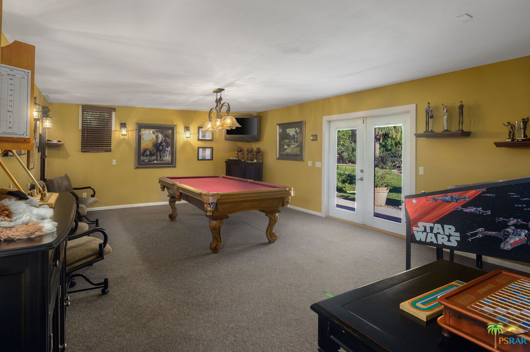 38851 Nielson Road Rancho Mirage, CA 92270 - Photo 41 of 50 a room with furniture pool table and windows