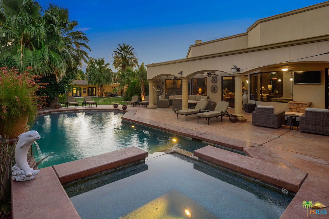 38851 Nielson Road Rancho Mirage, CA 92270 - Photo 46 of 50 a view of a patio with swimming pool table and chairs