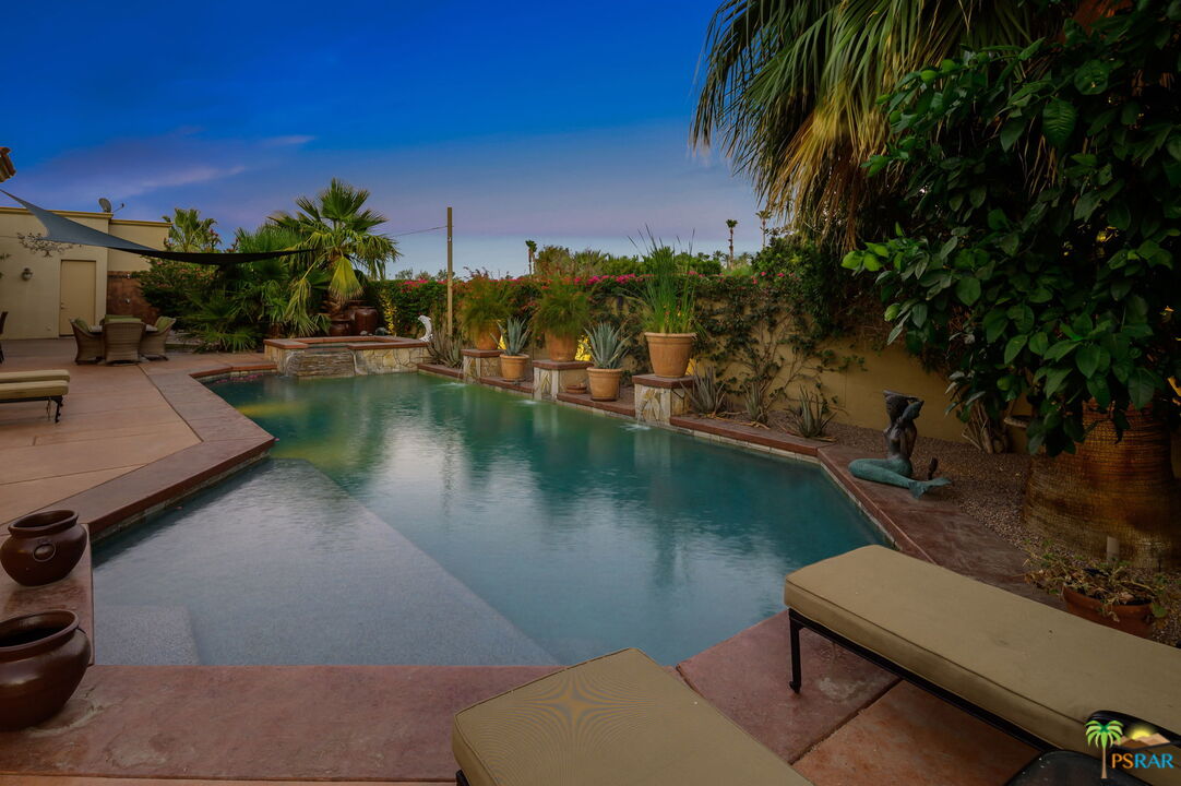 38851 Nielson Road Rancho Mirage, CA 92270 - Photo 47 of 50 a view of a lake with couches in the patio