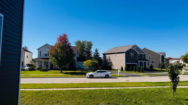 a house view with swimming pool garden view