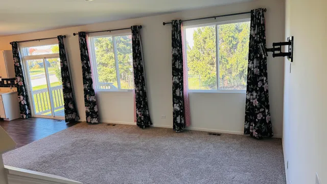 an empty room with windows