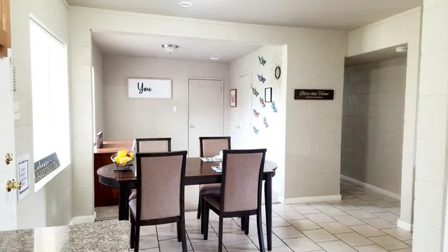 a view of a dining room with furniture