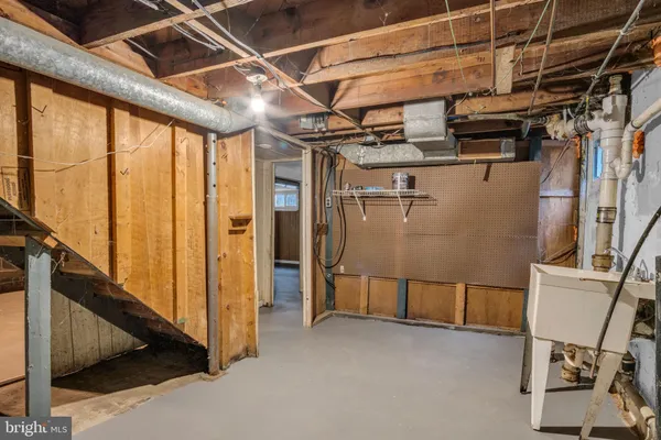 a view of a room with wooden walls