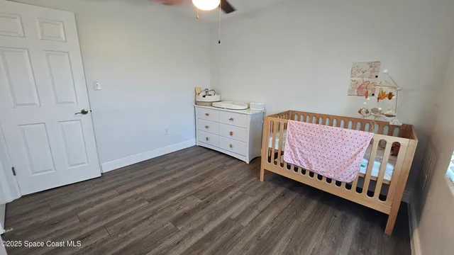 a room with furniture and wooden floor