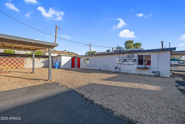 a kitchen that has a sink and a stove in it
