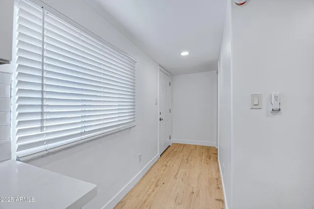 a view of a house with a street