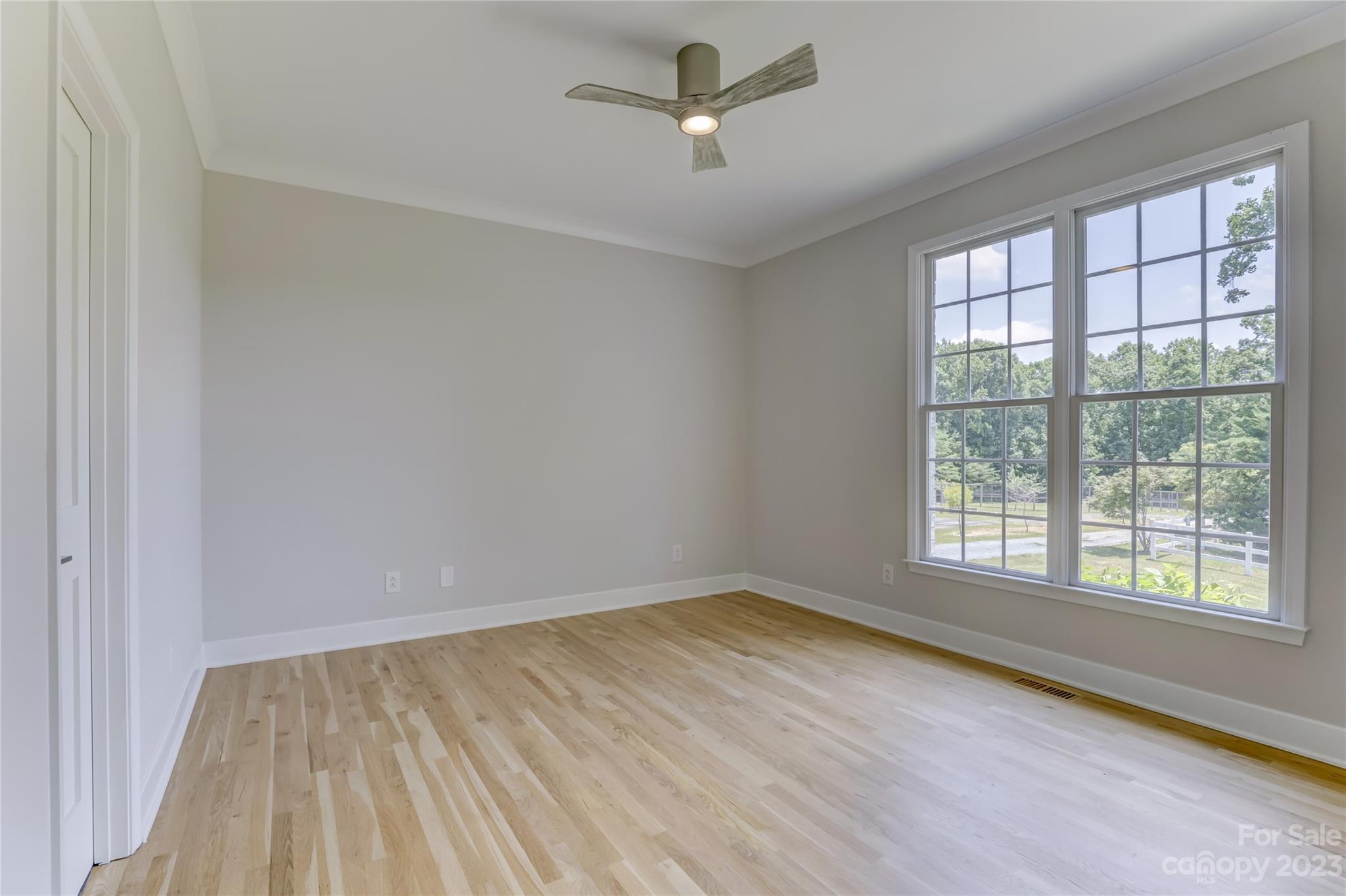 2354 Vineyard Road Fort Mill, SC 29708 - Photo 20 of 48 wooden floor in an empty room with a window