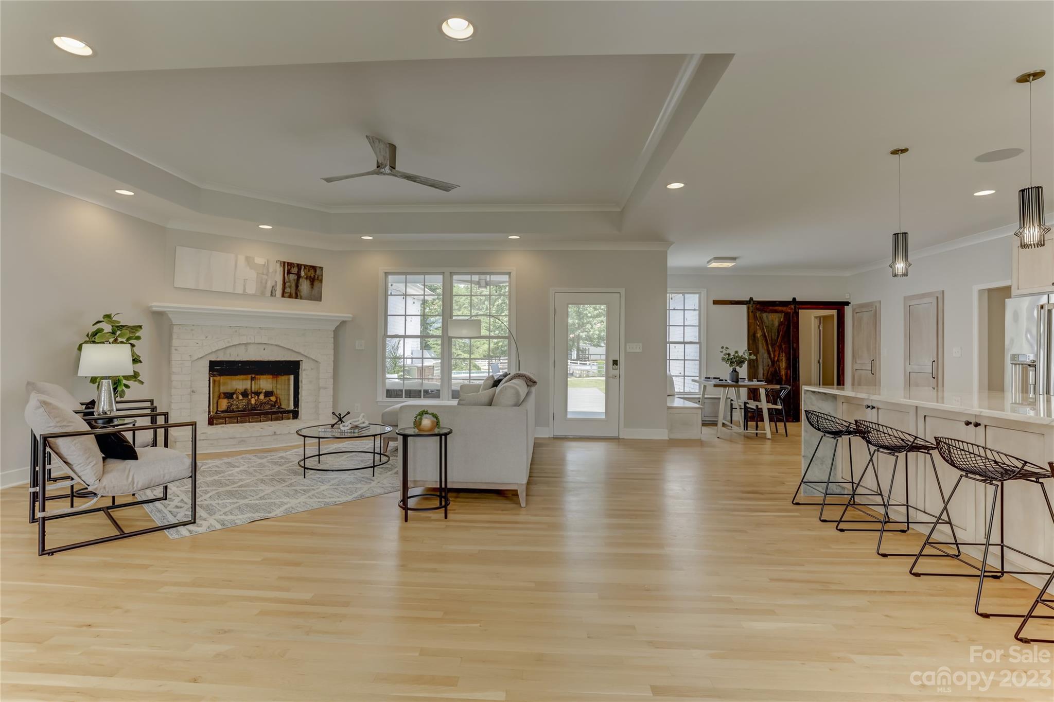2354 Vineyard Road Fort Mill, SC 29708 - Photo 6 of 48 a living room with furniture and a fireplace