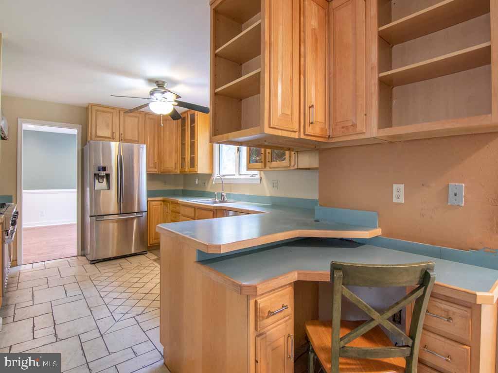 315 Saly Road Yardley, PA 19067 - Photo 9 of 43 Custom desk built into the kitchen area