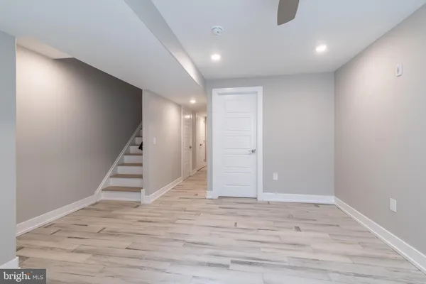 a view of entryway with wooden floor
