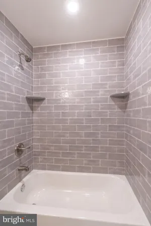 a bathroom with a bathtub