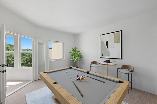 a bed room with a bed and a window