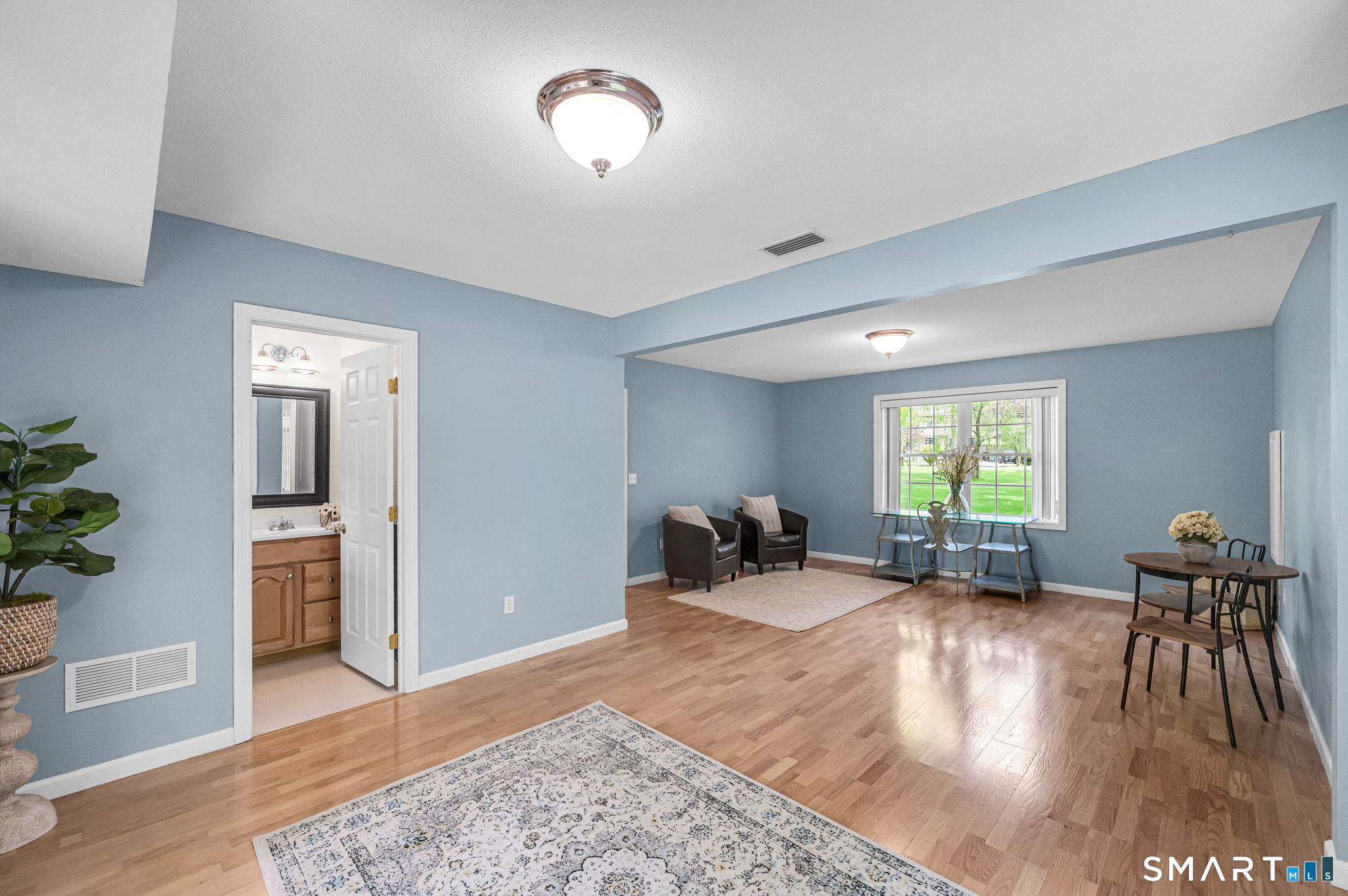 1001 Suffield Street Suffield, CT 06078 - Photo 21 of 30 a living room with furniture and a large window