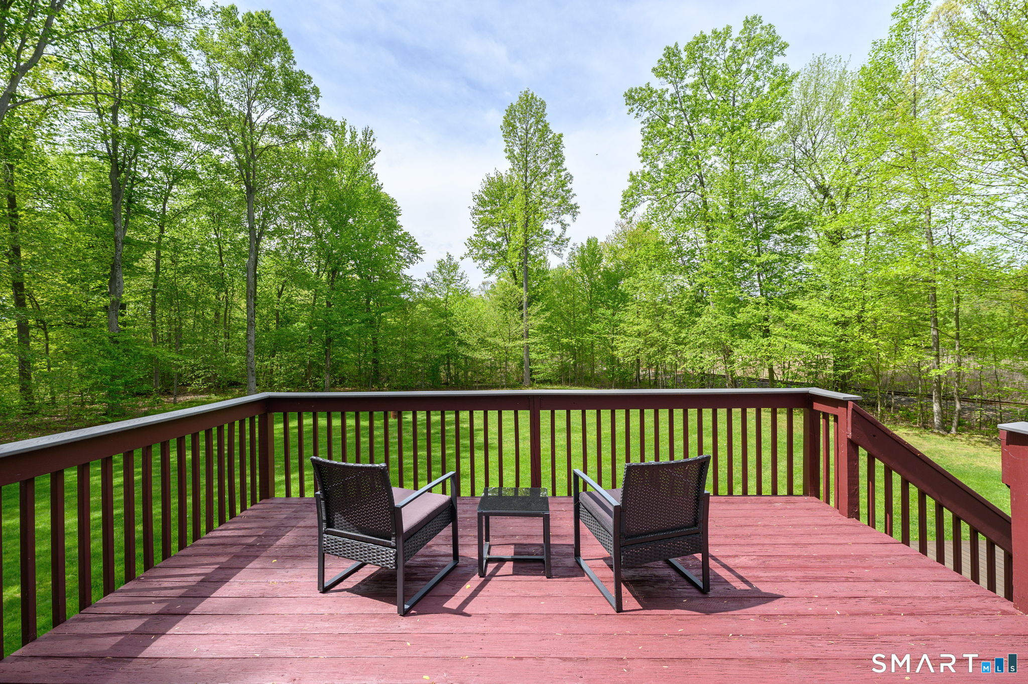 1001 Suffield Street Suffield, CT 06078 - Photo 23 of 30 a wooden bench sitting on top of a wooden deck