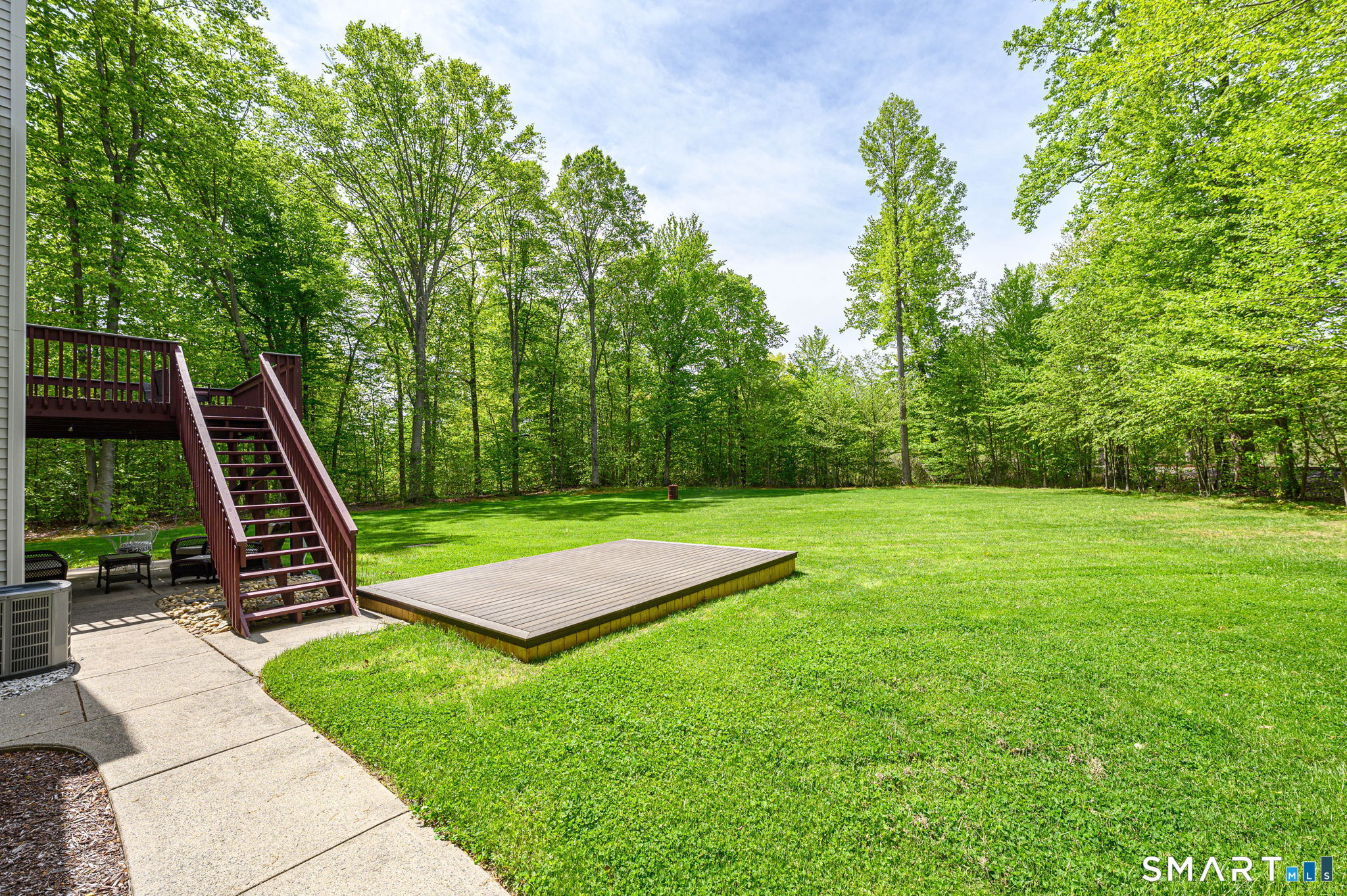 1001 Suffield Street Suffield, CT 06078 - Photo 26 of 30 a view of a backyard with a slide
