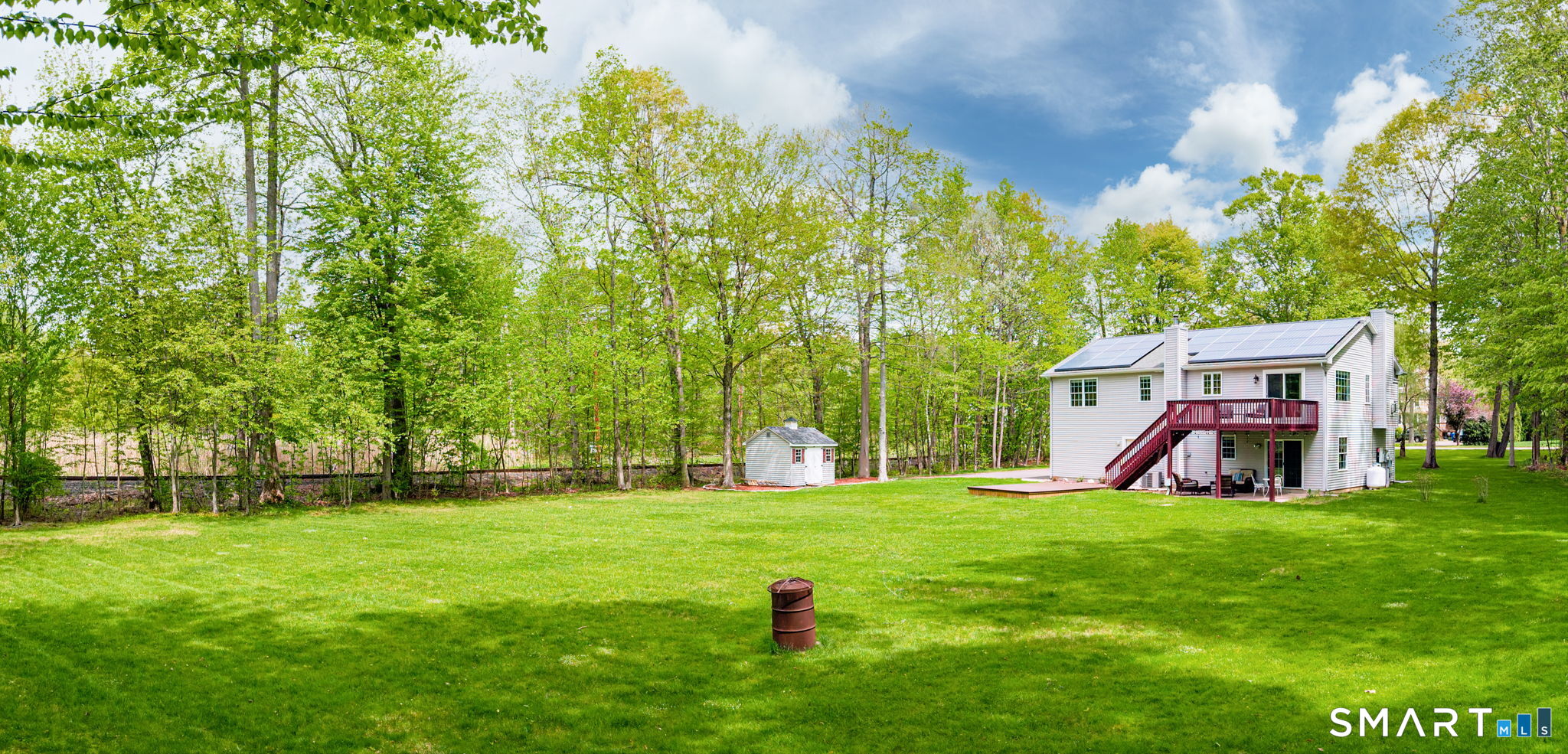 1001 Suffield Street Suffield, CT 06078 - Photo 27 of 30 a view of a house with a yard porch and sitting area
