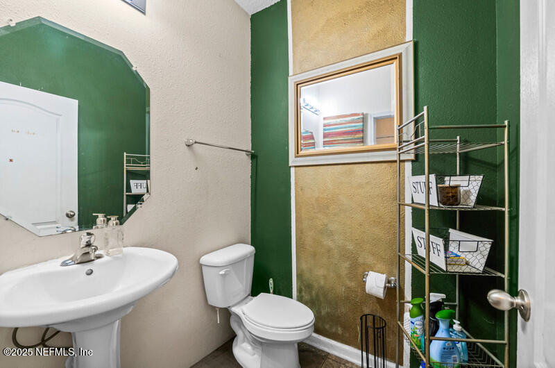 4076 Great Falls Loop Middleburg, FL 32068 - Photo 15 of 30 a bathroom with a sink toilet and shower