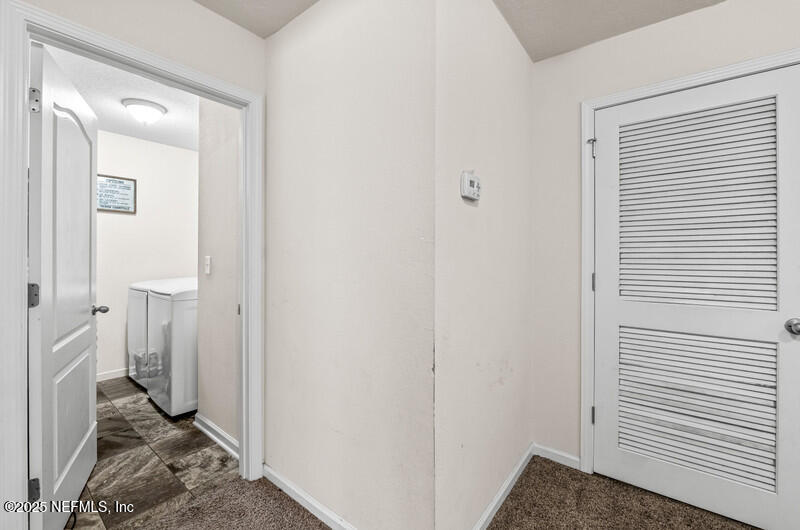 4076 Great Falls Loop Middleburg, FL 32068 - Photo 26 of 30 a view of a bathroom from a hallway