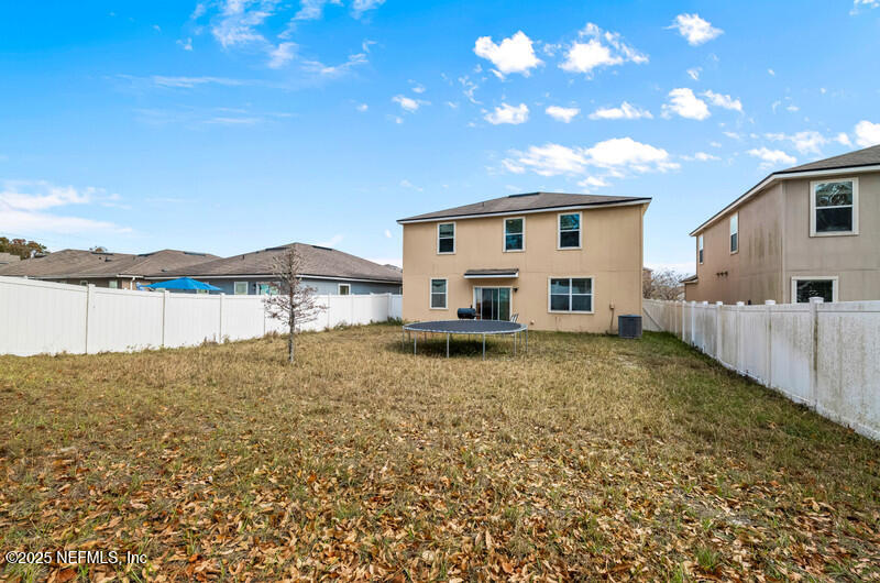 4076 Great Falls Loop Middleburg, FL 32068 - Photo 5 of 30 a view of a house with a yard