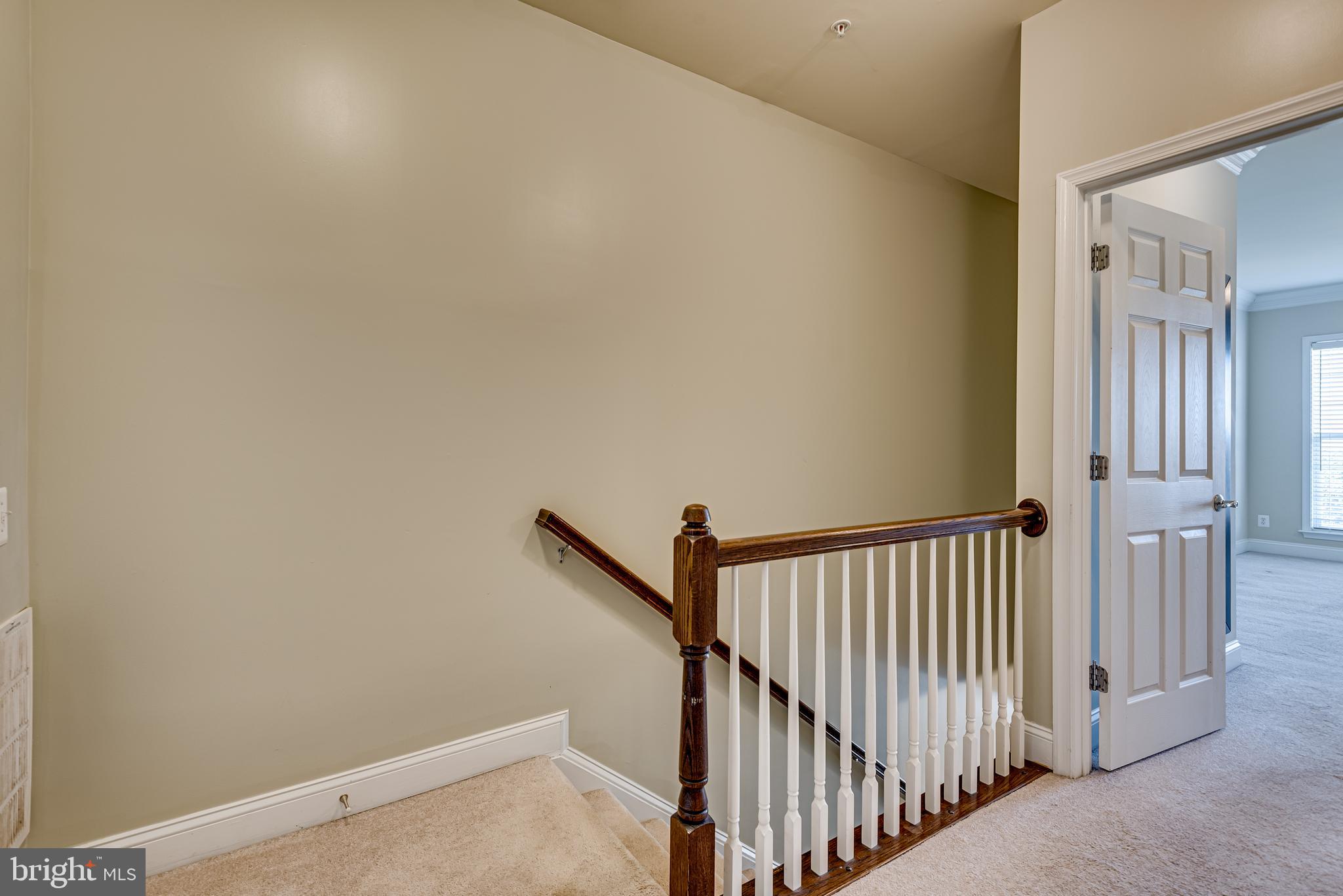 20654 Sibbald Square Ashburn, VA 20147 - Photo 20 of 43 a view of a hallway with entryway