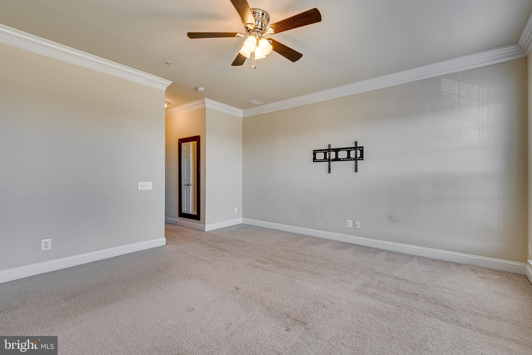 20654 Sibbald Square Ashburn, VA 20147 - Photo 25 of 43 an empty room with windows and fan