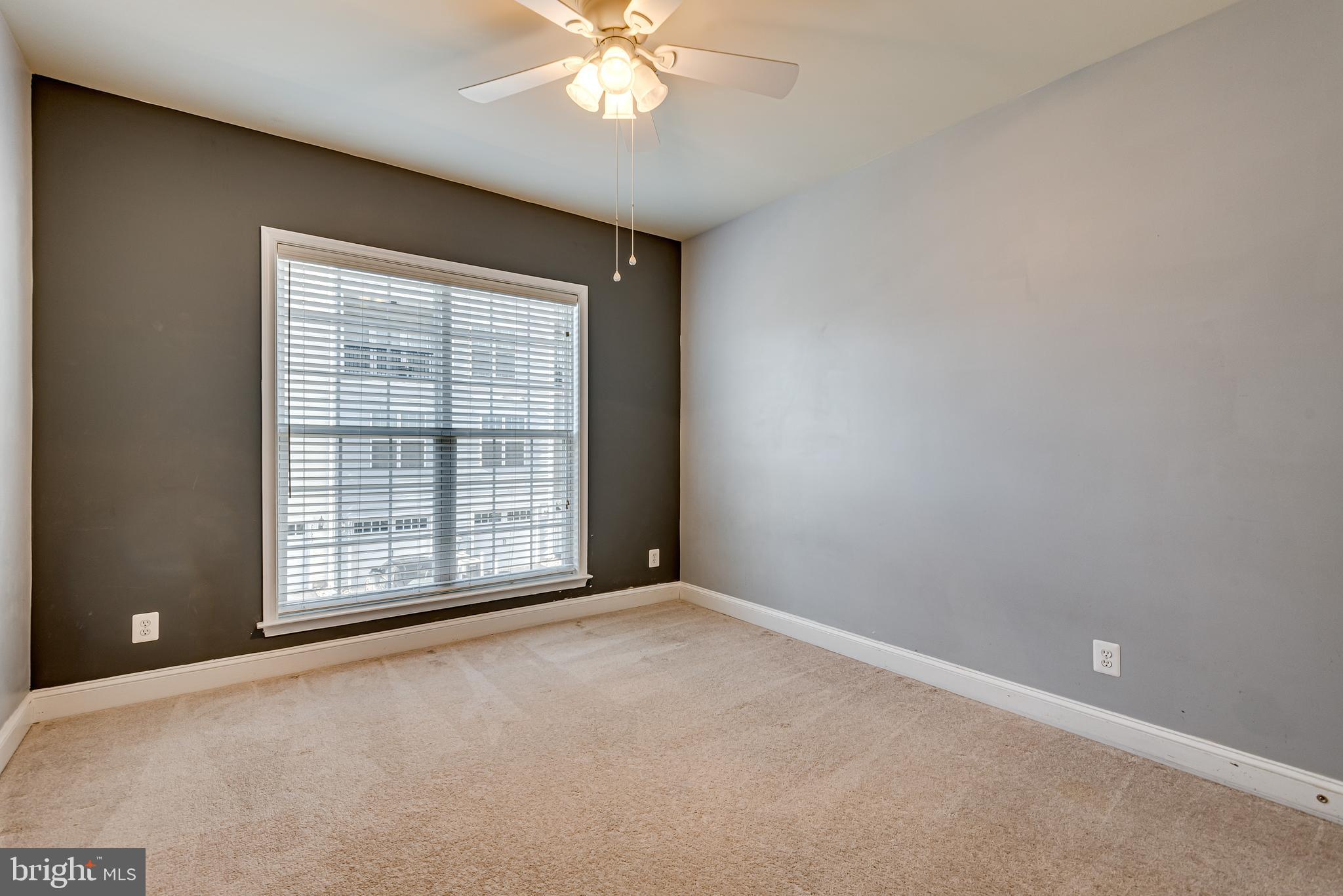 20654 Sibbald Square Ashburn, VA 20147 - Photo 36 of 43 an empty room with chandelier fan