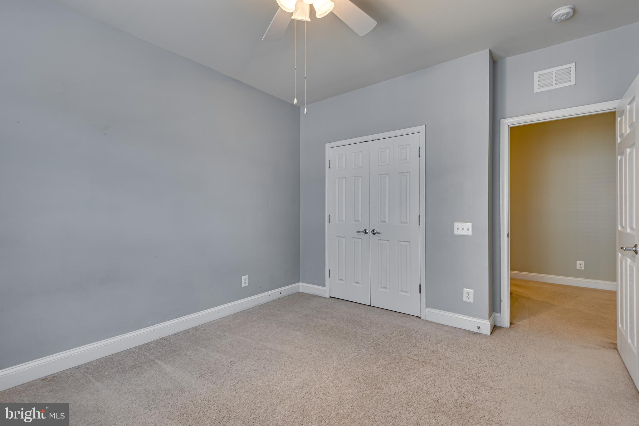 20654 Sibbald Square Ashburn, VA 20147 - Photo 37 of 43 a view of an empty room and chandelier fan